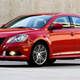 A red Suzuki Kizashi.